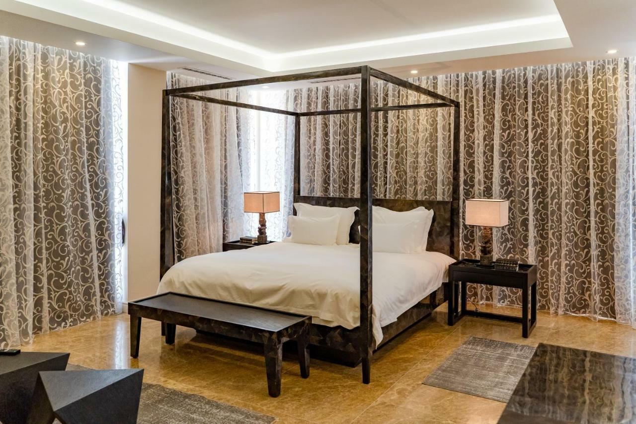 Lighthouse Golf & Spa Hotel Balchik Bagian luar foto A bedroom at the hotel